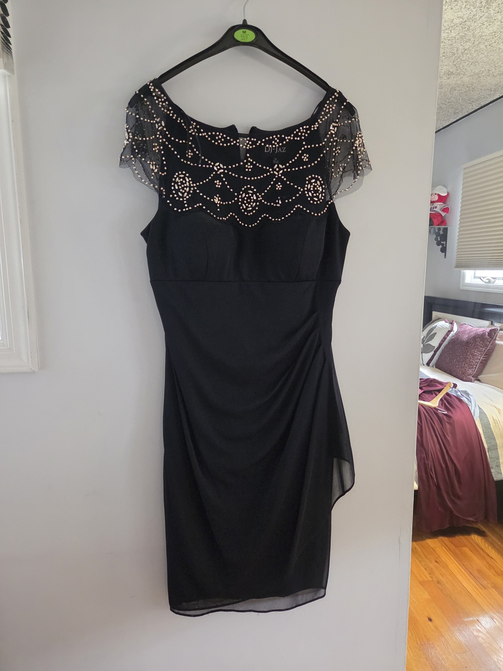 Elegant Black Cocktail Dress with Embellished Yoke